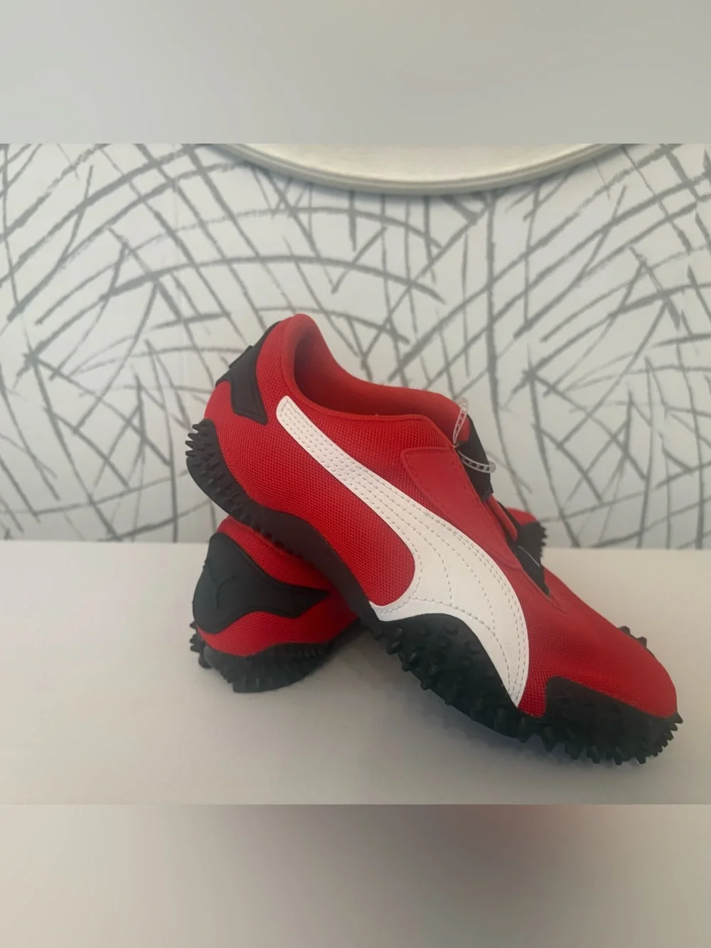 PUMA Mostro OG Sneakers. Vibrant  Red with a Unique Spike Sole.